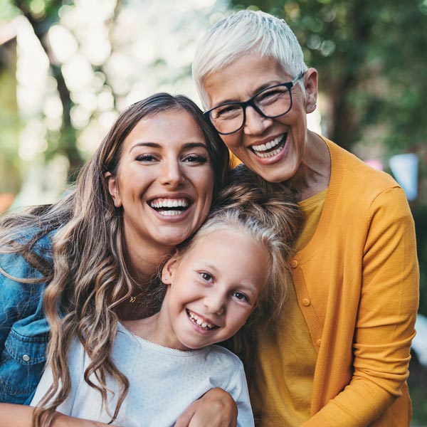 Woman in Tempe, AZ, happy after getting professional dental care at Tempe Smiles