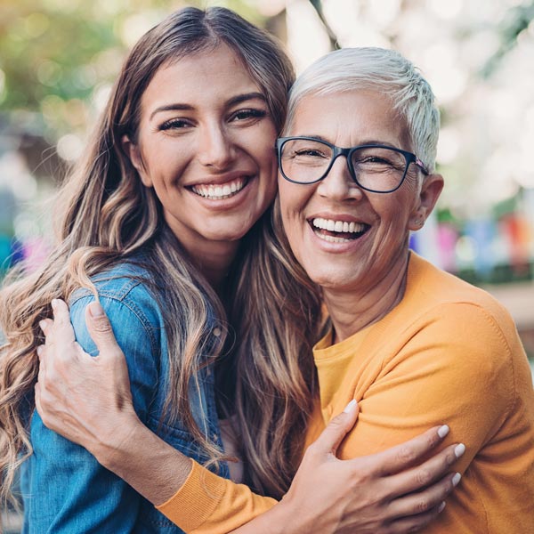 mother and daughter hugging