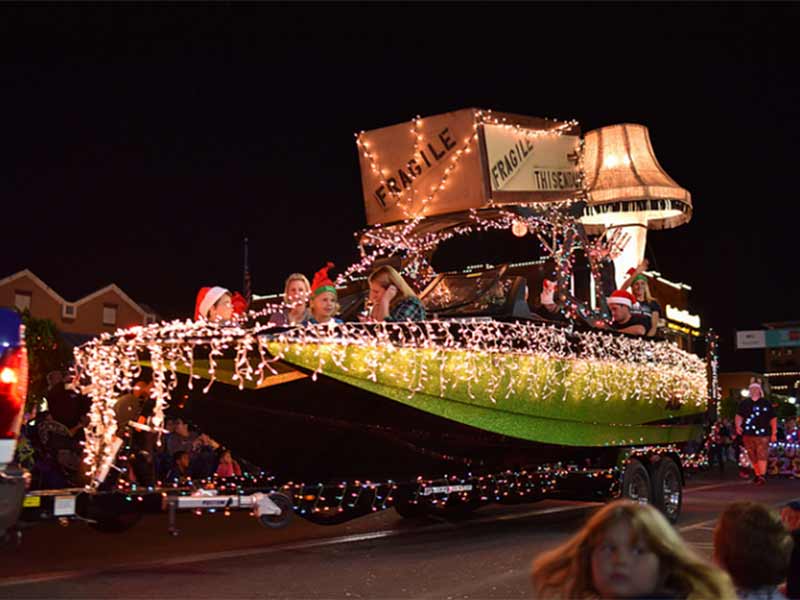 lit up christmas float in parade