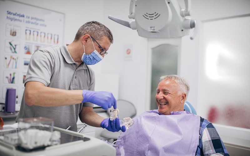 Dentist explaining the Dental Procedure at Tempe Smiles Family Dental